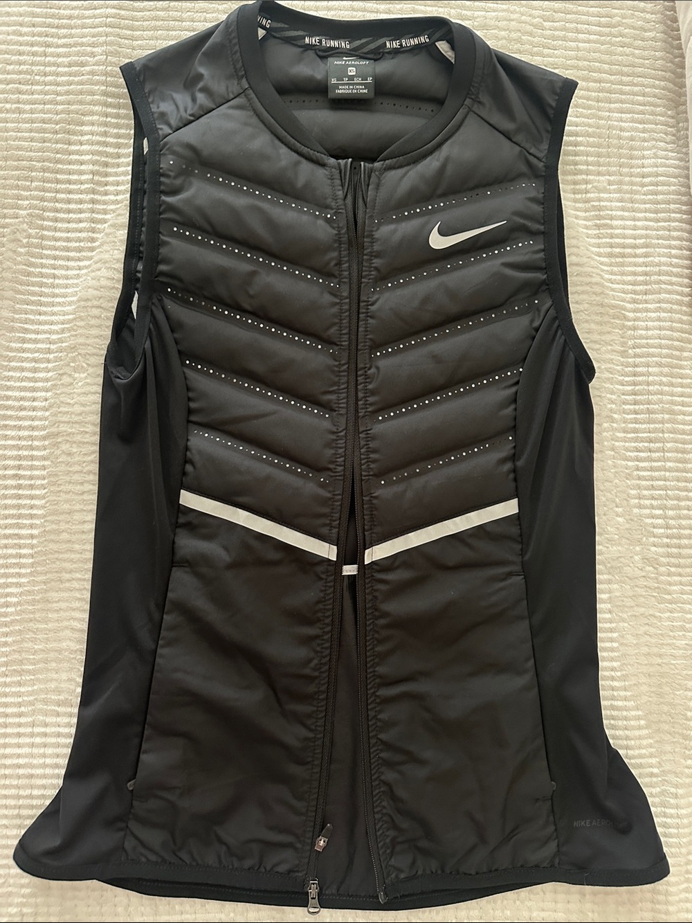 Nike Women’s Black Sleeveless Padded Running Vest with Reflective Accents